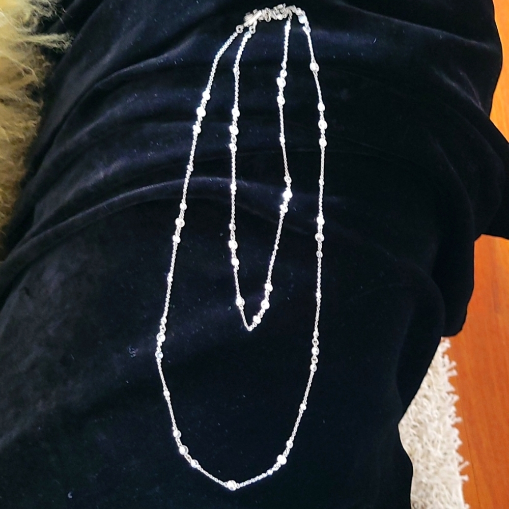 Henri Bendel 48" silver and Swarovski crystal necklace